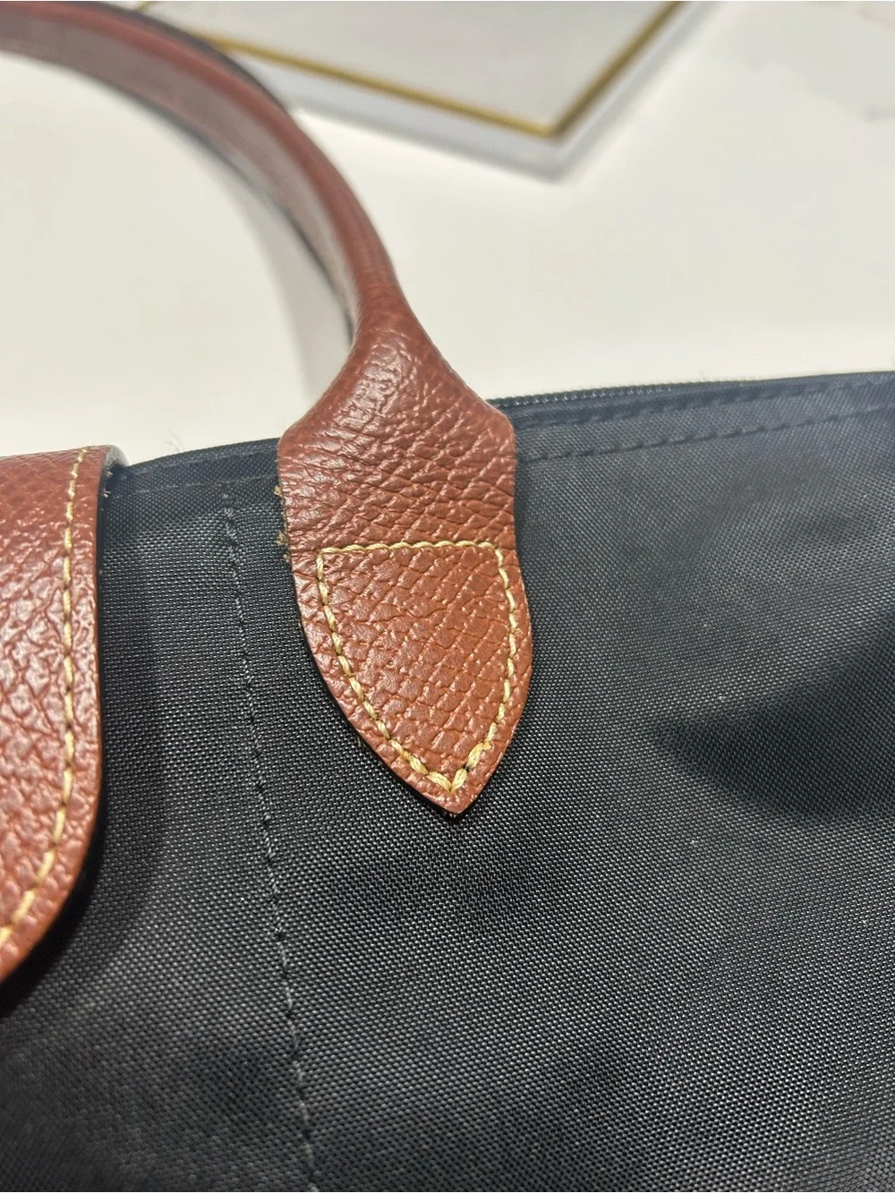 Longchamp Black Tote with Brown Trim and Handles